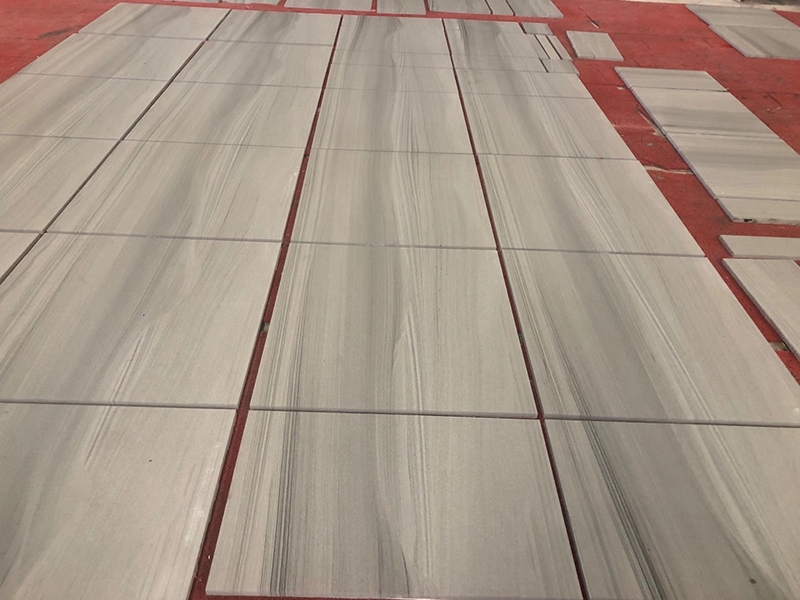 Diagonal grey sandstone tiles